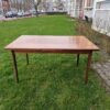 Mid-century modern extendable dining table.