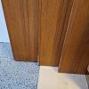 Rundt spisebord i teak med 4 tillægsplader