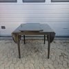 Kvadratisk spisebord med to tillægsplader og endebuer i bejdset egetræ — billede 2